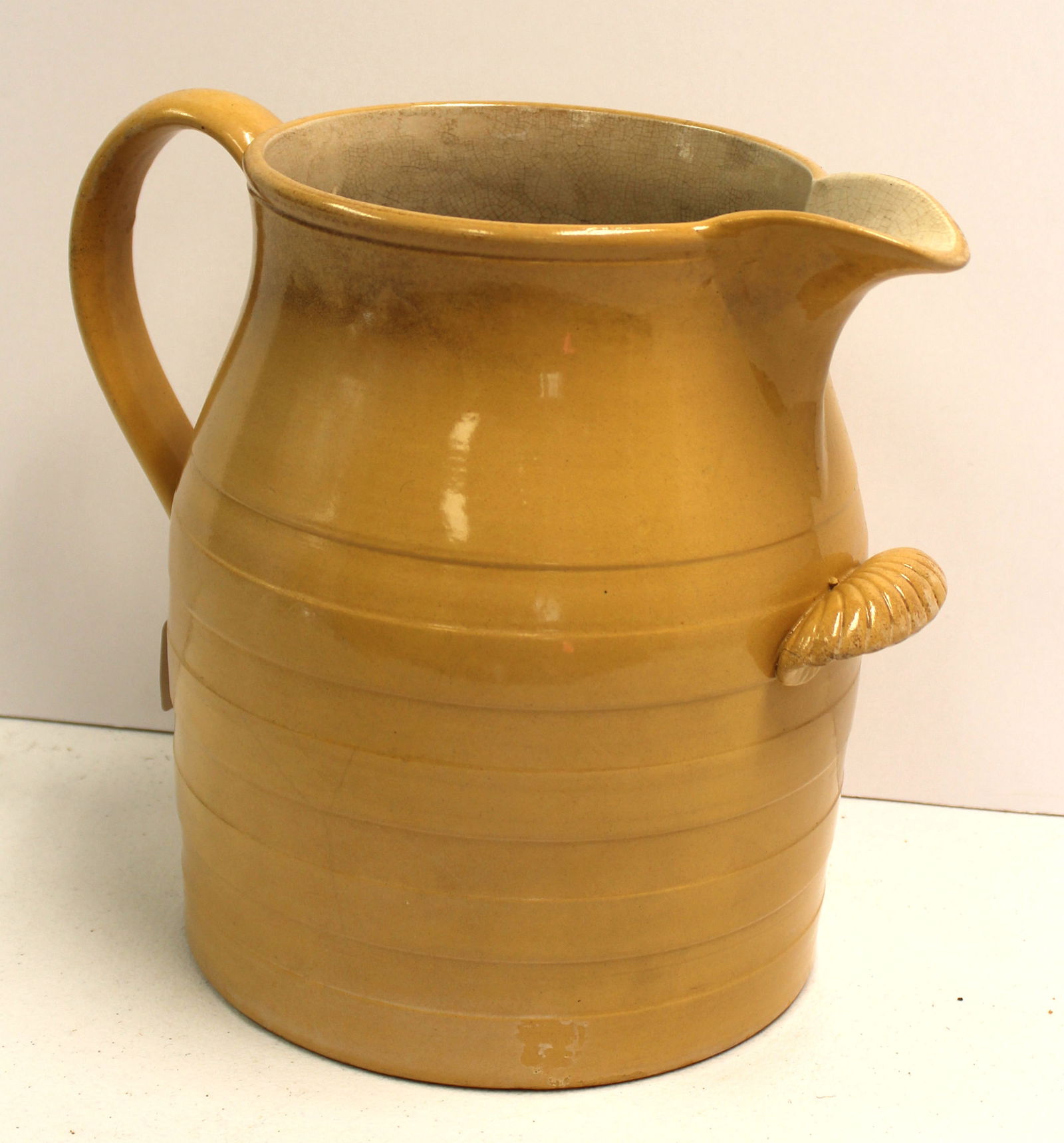 Antique earthenware water pitcher w lug handle - 11" tall x 14" at widest: Antique earthenware water pitcher w lug handle - 11" tall x 14" at widest