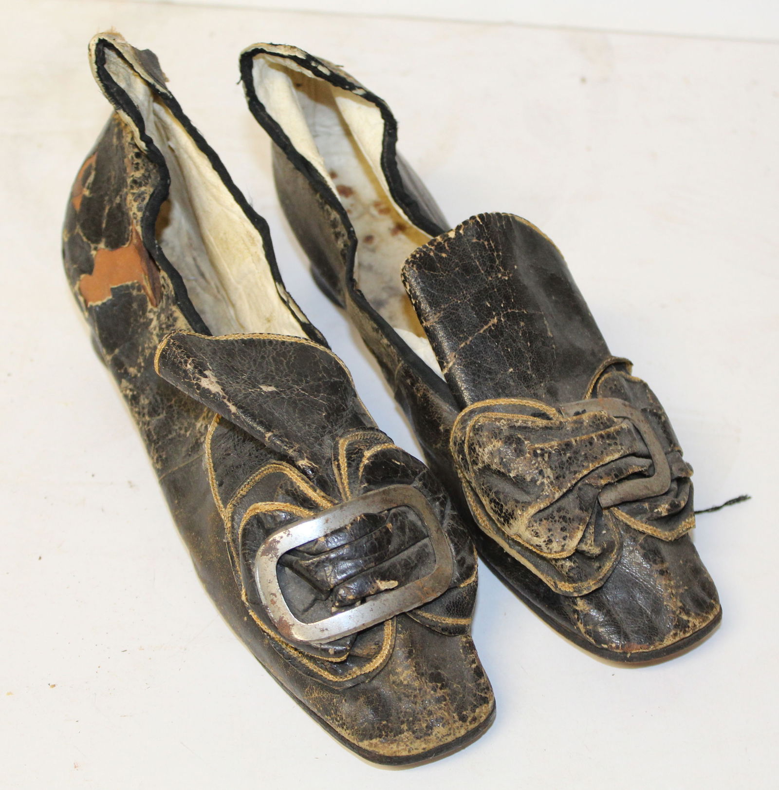 Pr of antique ladies leather shoes w metal buckle - approx 9" heel to toe: Pr of antique ladies leather shoes w metal buckle - approx 9" heel to toe