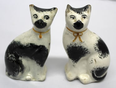 Near pair of Staffordshire small black & white cats w gold bows - as found - 3 1/2"- 4" tall