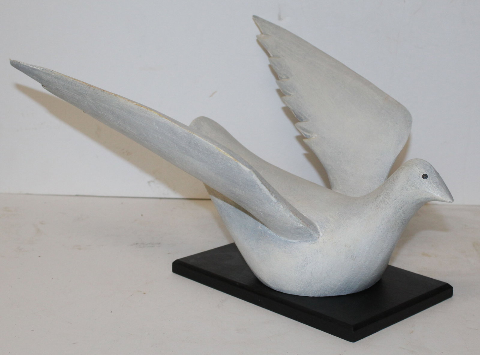 Folk Art wooden painted white dove on black wooden base - 7 1/2" tall x 15": Folk Art wooden painted white dove on black wooden base - 7 1/2" tall x 15"