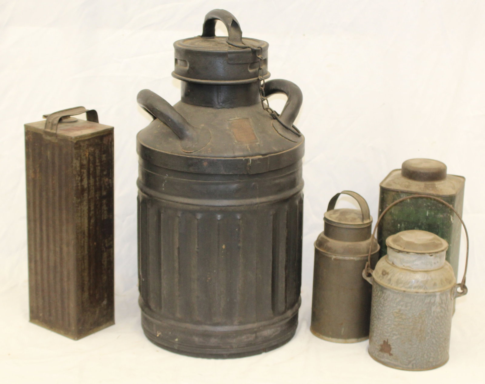 Lot of antique tin cannisters plus a kerosene cannister -: Lot of antique tin cannisters plus a kerosene cannister -