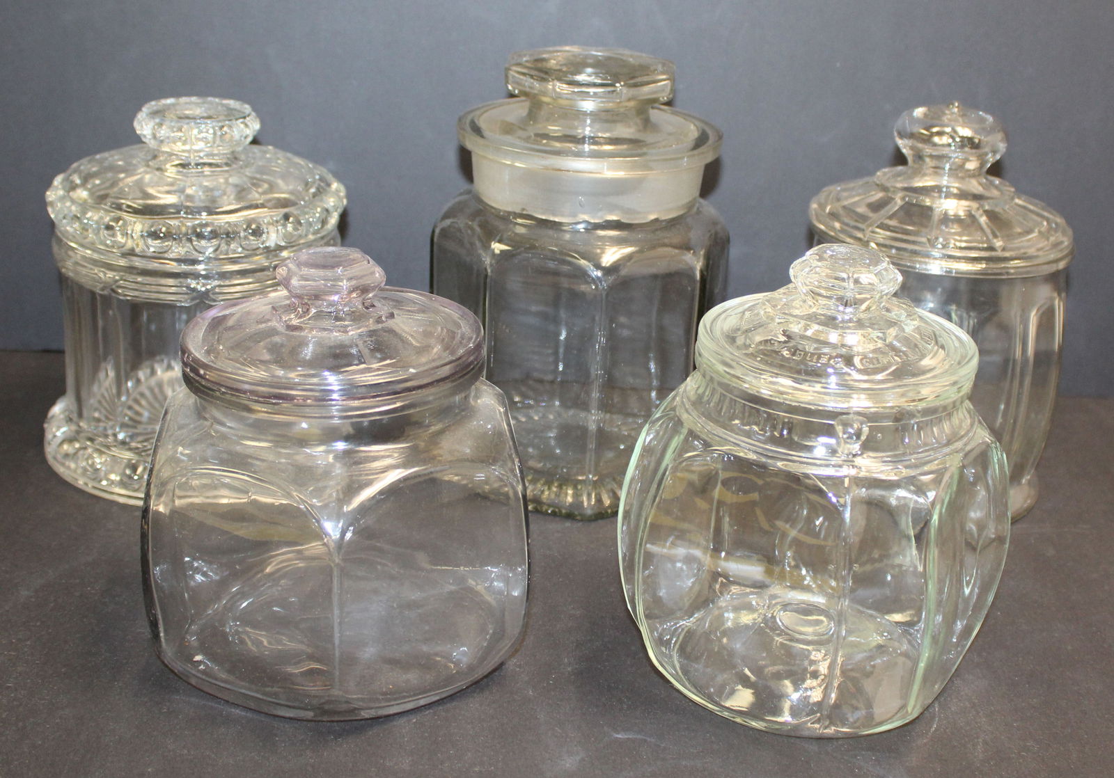 Lot of 5 glass apothecary/candy jars w covers - 6 3/4" - 8 3/4" tall (1 of 6)