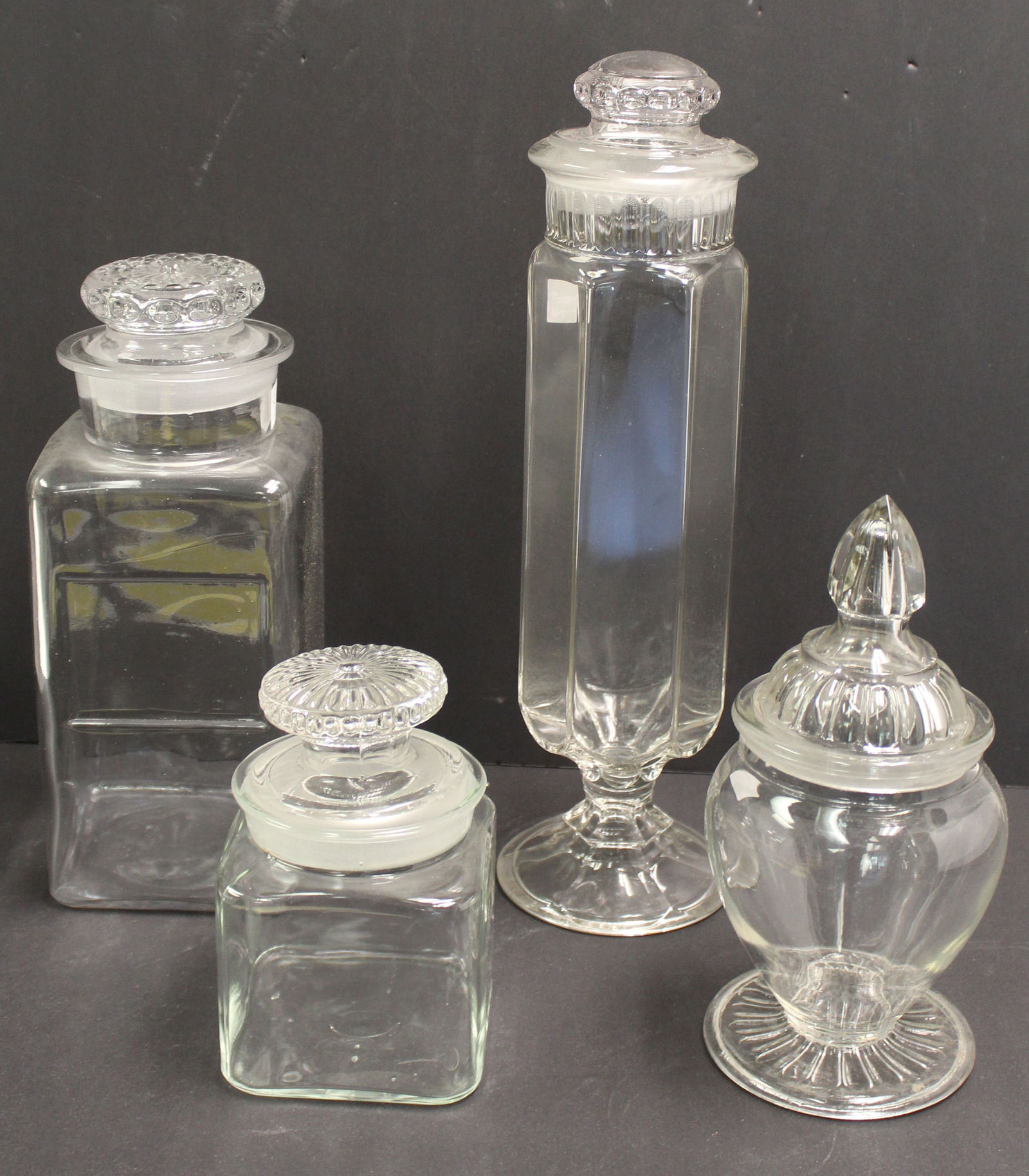 Lot of 4 glass apothecary jars in various shapes & sizes - 7", 10 1/2", 11" & 13" tall: Lot of 4 glass apothecary jars in various shapes & sizes - 7", 10 1/2", 11" & 13" tall
