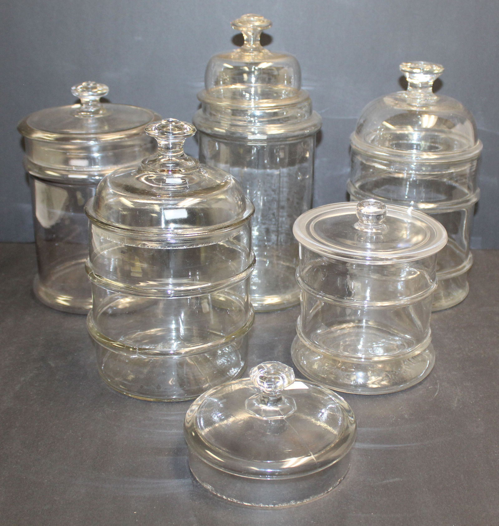 Lot of 5 glass apothecary jars in various shapes & sizes plus an extra lid/cover - 5" diam extra lid (1 of 7)