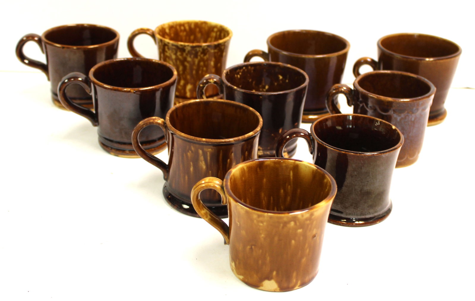 Lot of 10 Bennington/Rockingham mugs: Lot of 10 Bennington/Rockingham mugs