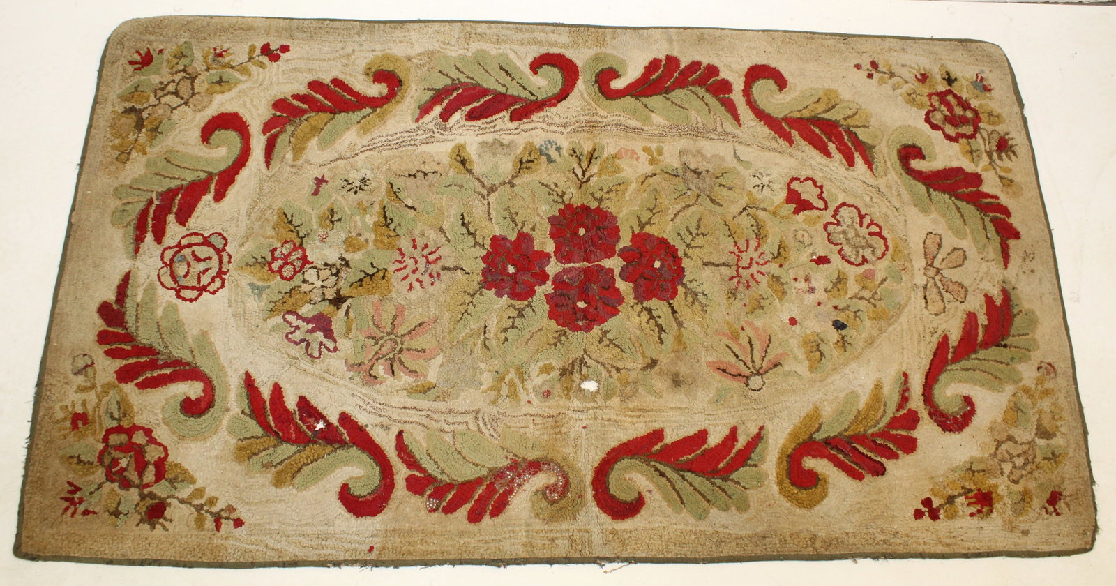 Antique hooked rug w floral center - 39"x68": Antique hooked rug w floral center - 39"x68"