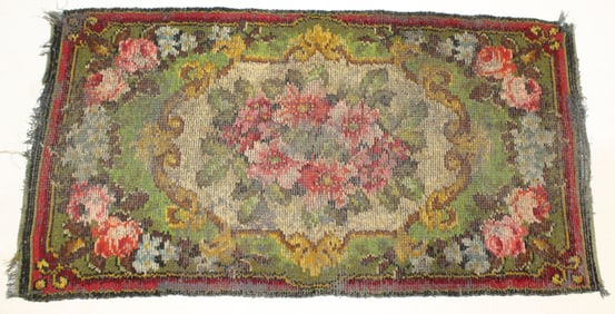 Well worn antique hooked rug w floral motif - 30"x55"