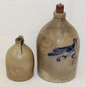 Lot of 2 stoneware jugs incl 1 w cobalt bird dec - 7" & 13" tall