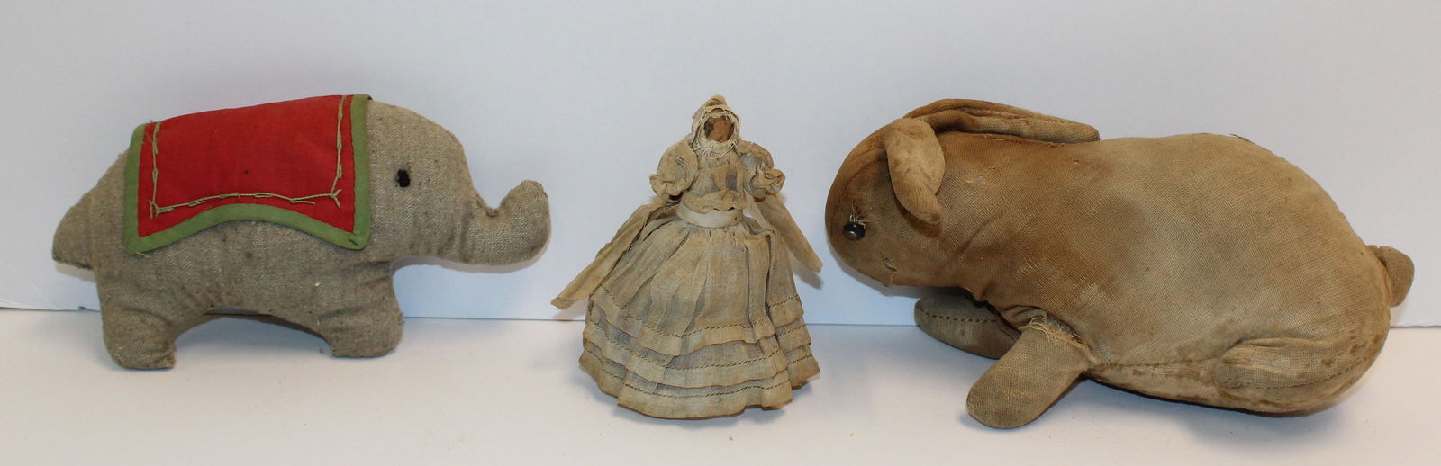 Lot of 3 small toys incl straw filled bunny, cloth elephant & small wooden doll - 4"x9" bunny, 4" (1 of 7)