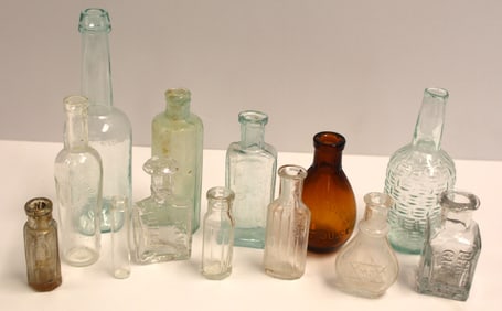 Lot of 13 miniature bottles in clear, aqua & amber glass - 2 1/4" - 6" tall