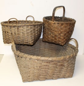 Lot of 3 antique baskets - 2 handled & 1 fixed handled - 14" tall x 13" diam; 9" tall x 16" diam &