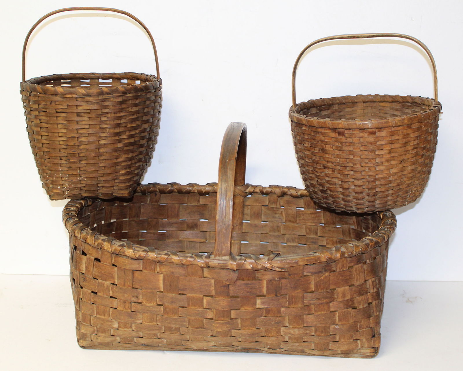 Lot of 3 antique fixed handled baskets - 12" tall x 9" diam, 10 1/2" tall x 10" diam & 12 1/2" tall (1 of 11)