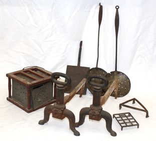 Lot of antique fireplace related incl andirons, footwarmer, trivets, & 2 pierced spoons