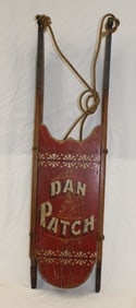 Antique red painted sled "Dan Patch" paint dec