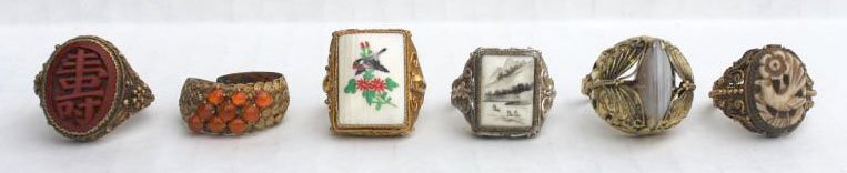 6 Chinese rings - 2 scrimshawed ivory; 1 carved ivory b: 6 Chinese rings - 2 scrimshawed ivory; 1 carved ivory bird; 1 moonstone' 1 carnelian & 1 cinnabar