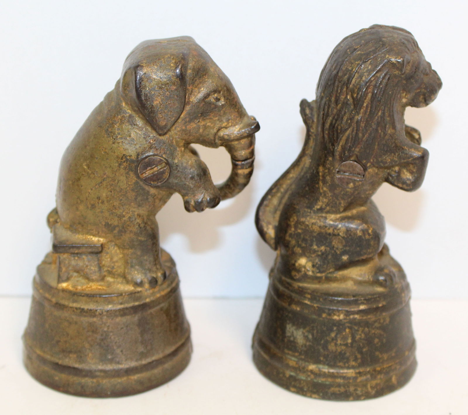 Lot of 2 antique cast iron still banks - Lion & Elephant on barrels - 4 1/2" tall: Lot of 2 antique cast iron still banks - Lion & Elephant on barrels - 4 1/2" tall