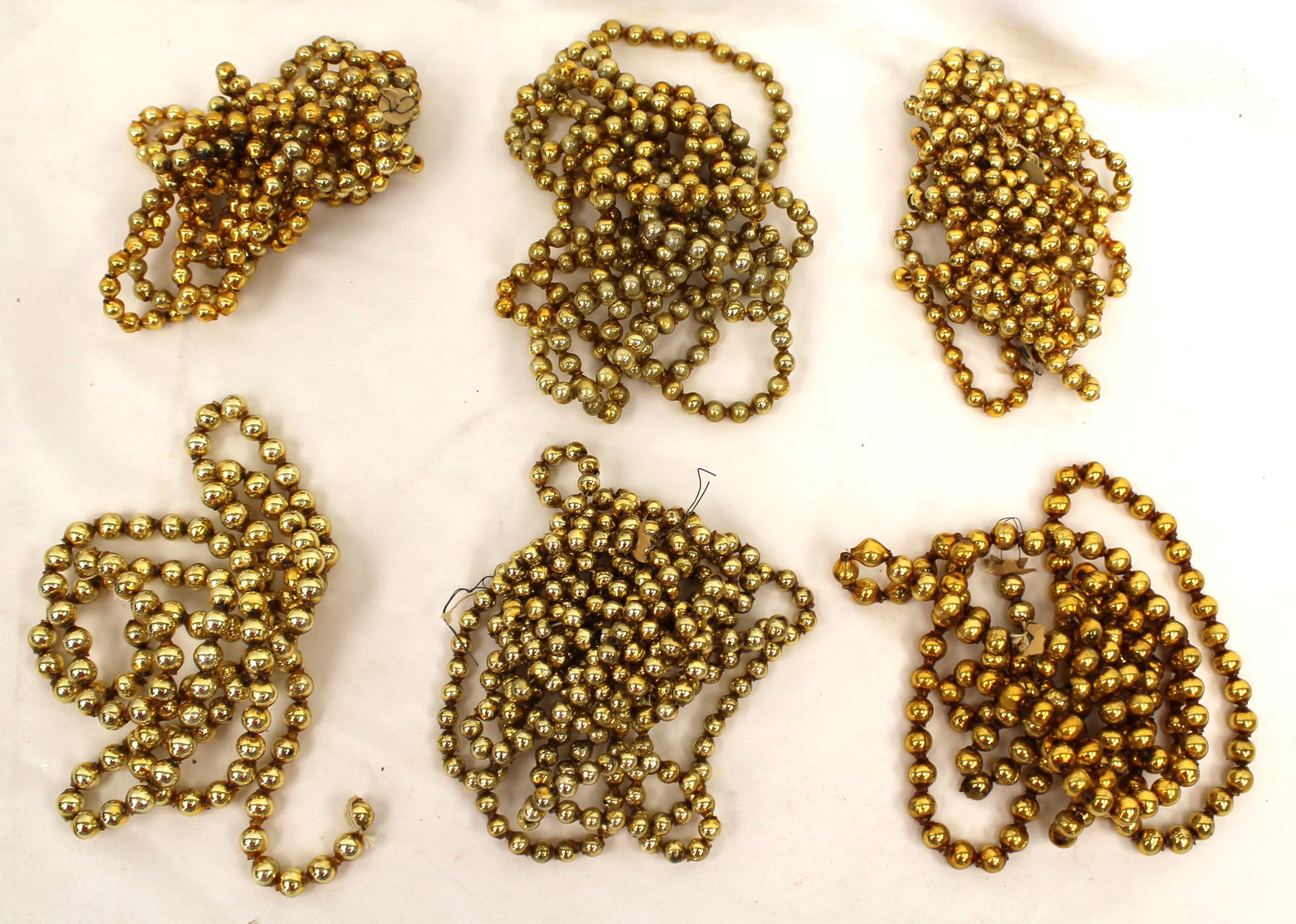 Lot of 6 vintage/antique gold glass bead garlands: Lot of 6 vintage/antique gold glass bead garlands