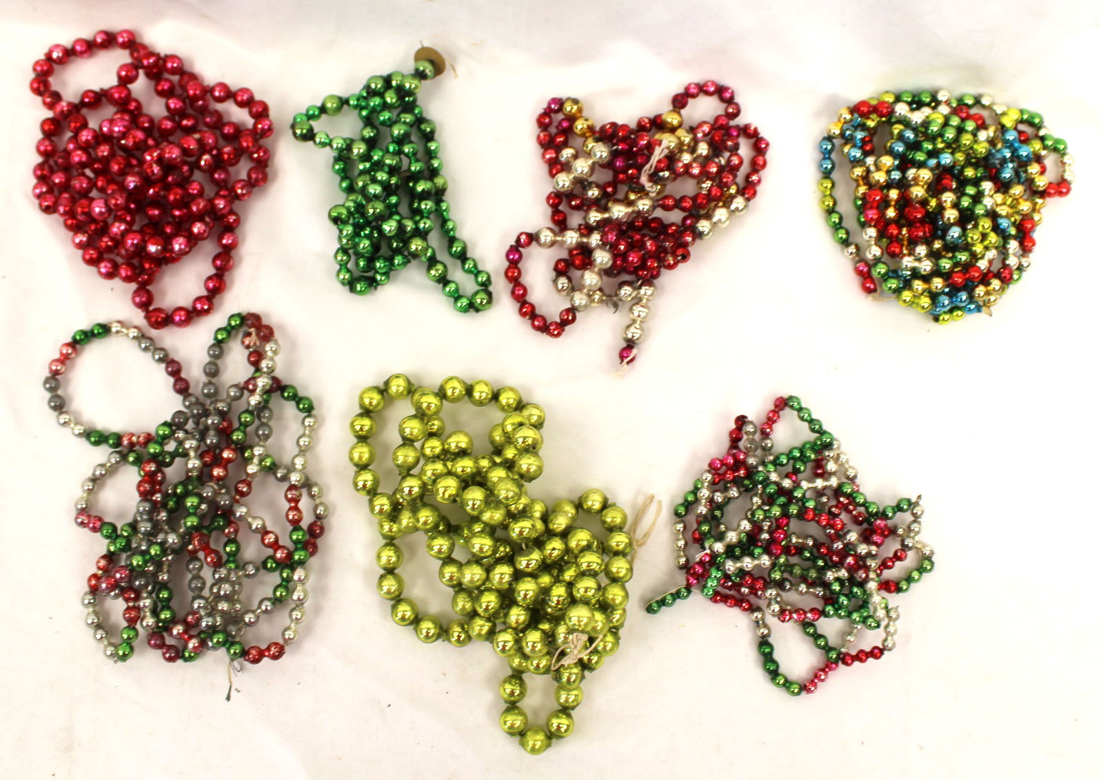 Lot of 7 vintage/antique glass bead garlands in multiple colors: Lot of 7 vintage/antique glass bead garlands in multiple colors