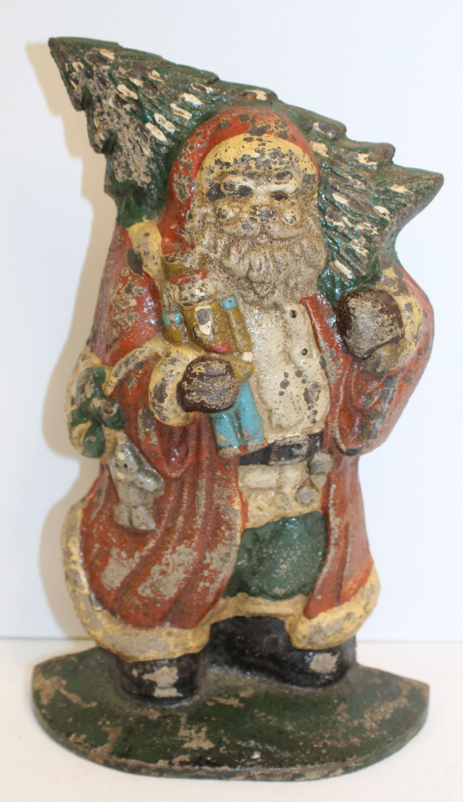 Antique cast iron painted doorstop - Santa w Christmas tree & toy soldier - 10" tall (1 of 4)