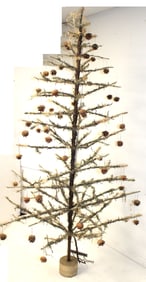 Large antique/vintage Christmas feather tree w lights & contemporary pinecone ornaments on wooden