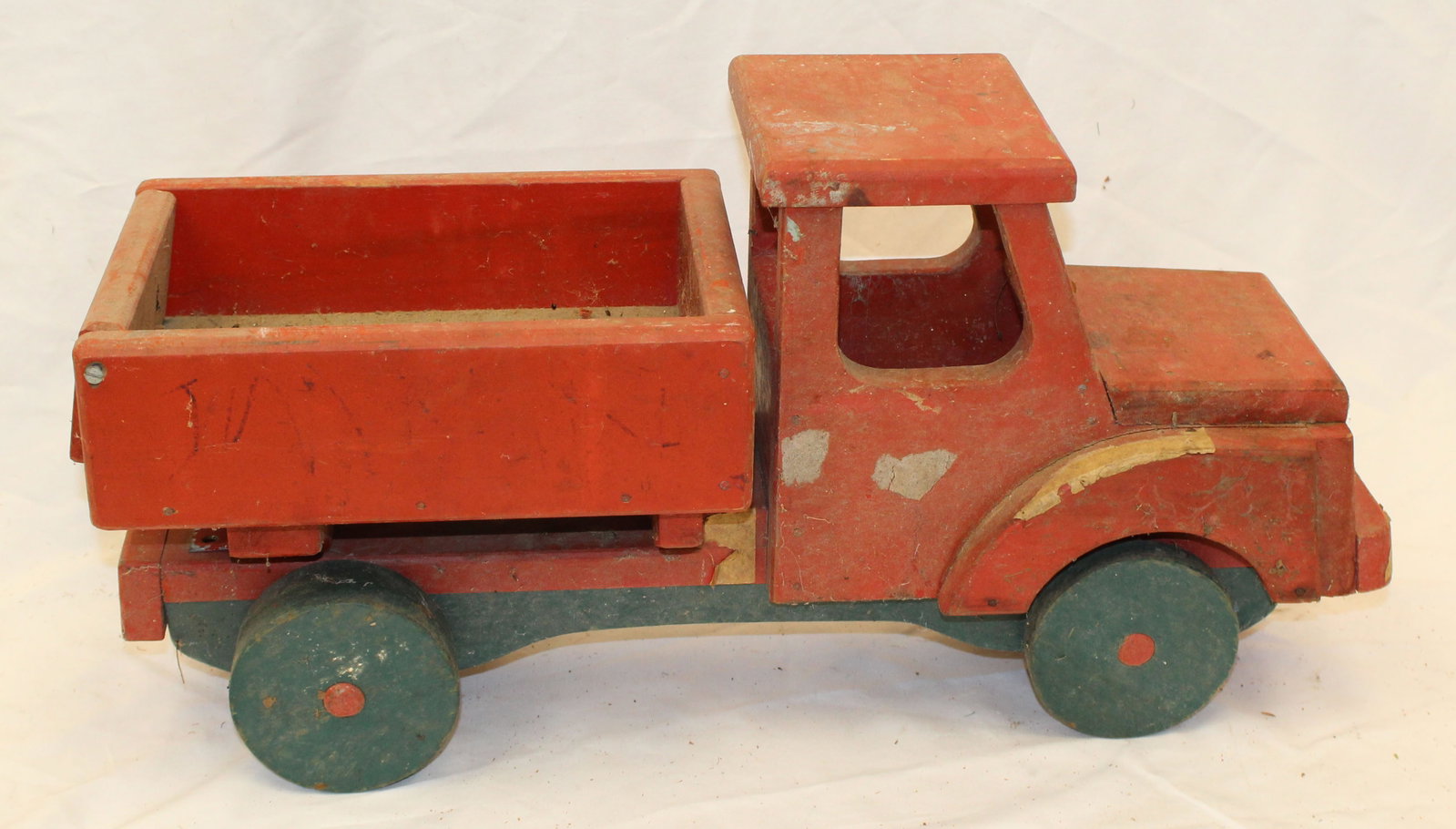 Vintage wooden painted dump truck in red & green - 12" tall x 24" long x 8" wide: Vintage wooden painted dump truck in red & green - 12" tall x 24" long x 8" wide