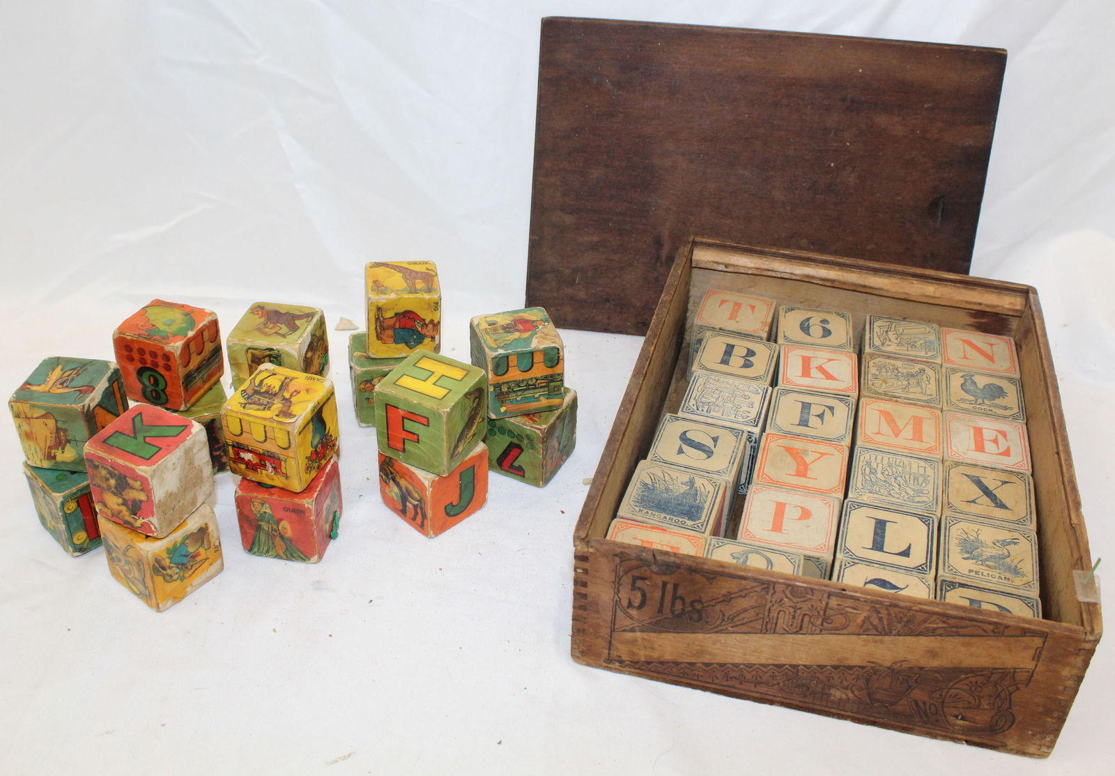 Antique wooden block lot incl some w lithoed paper graphics & carved wooden in slide top box (1 of 5)