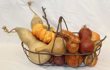 Wire basket w dried, cardboard & wooden gourds centerpiece