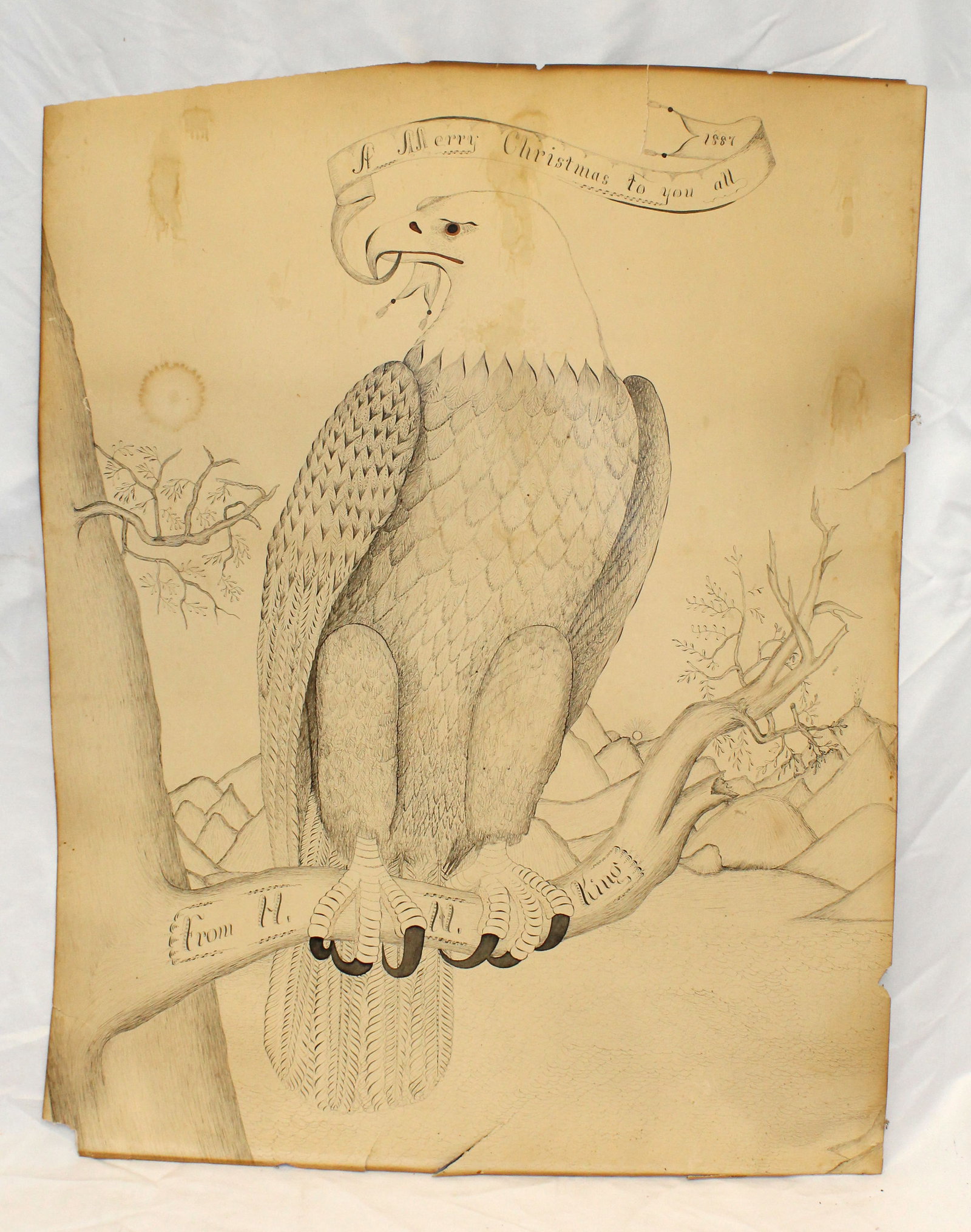 Christmas themed drawing with an eagle holding a banner in its beak “A Merry Christmas To You All: Christmas themed drawing with an eagle holding a banner in its beak “A Merry Christmas To You All – 1887”