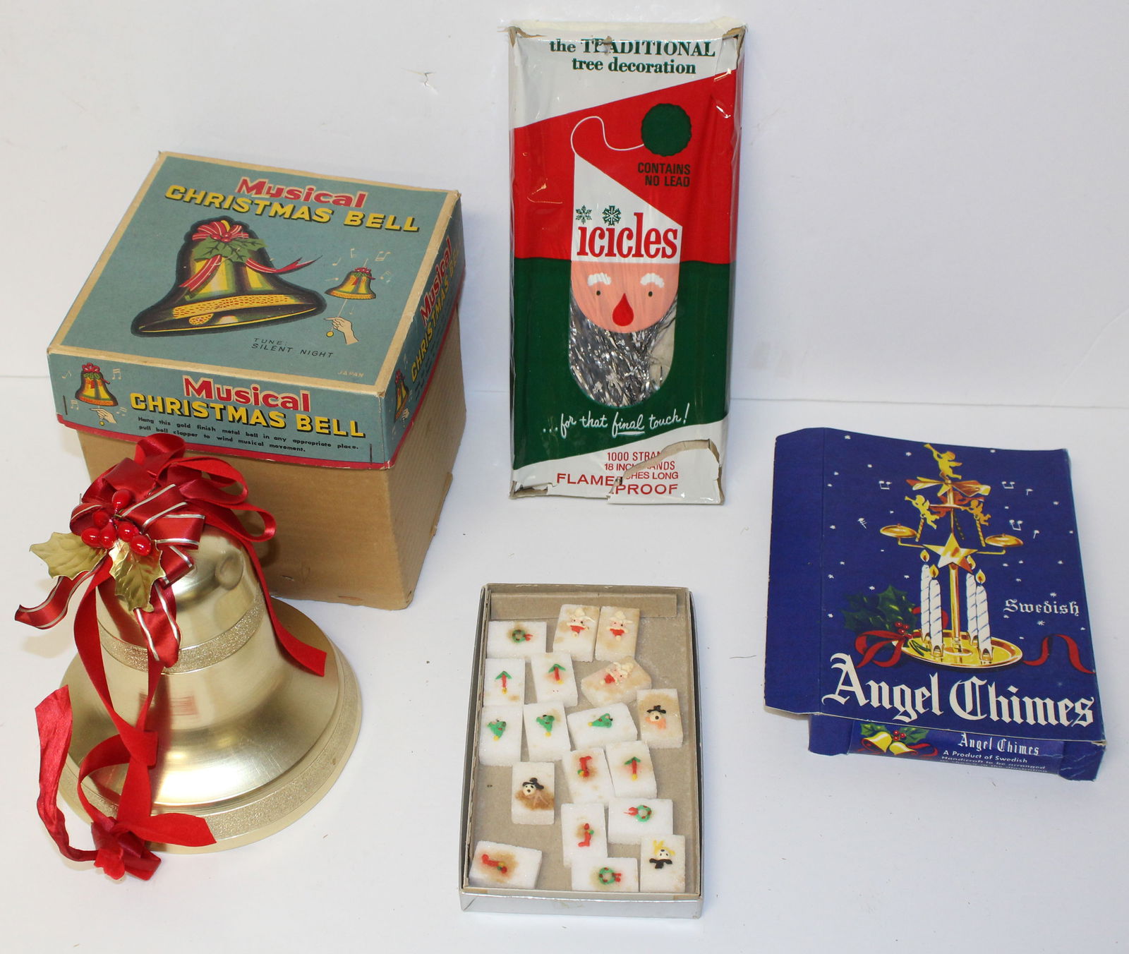 Christmas decoration lot in orig boxes incl bell hanging decoration, icicles & chimes plus a box of (1 of 7)