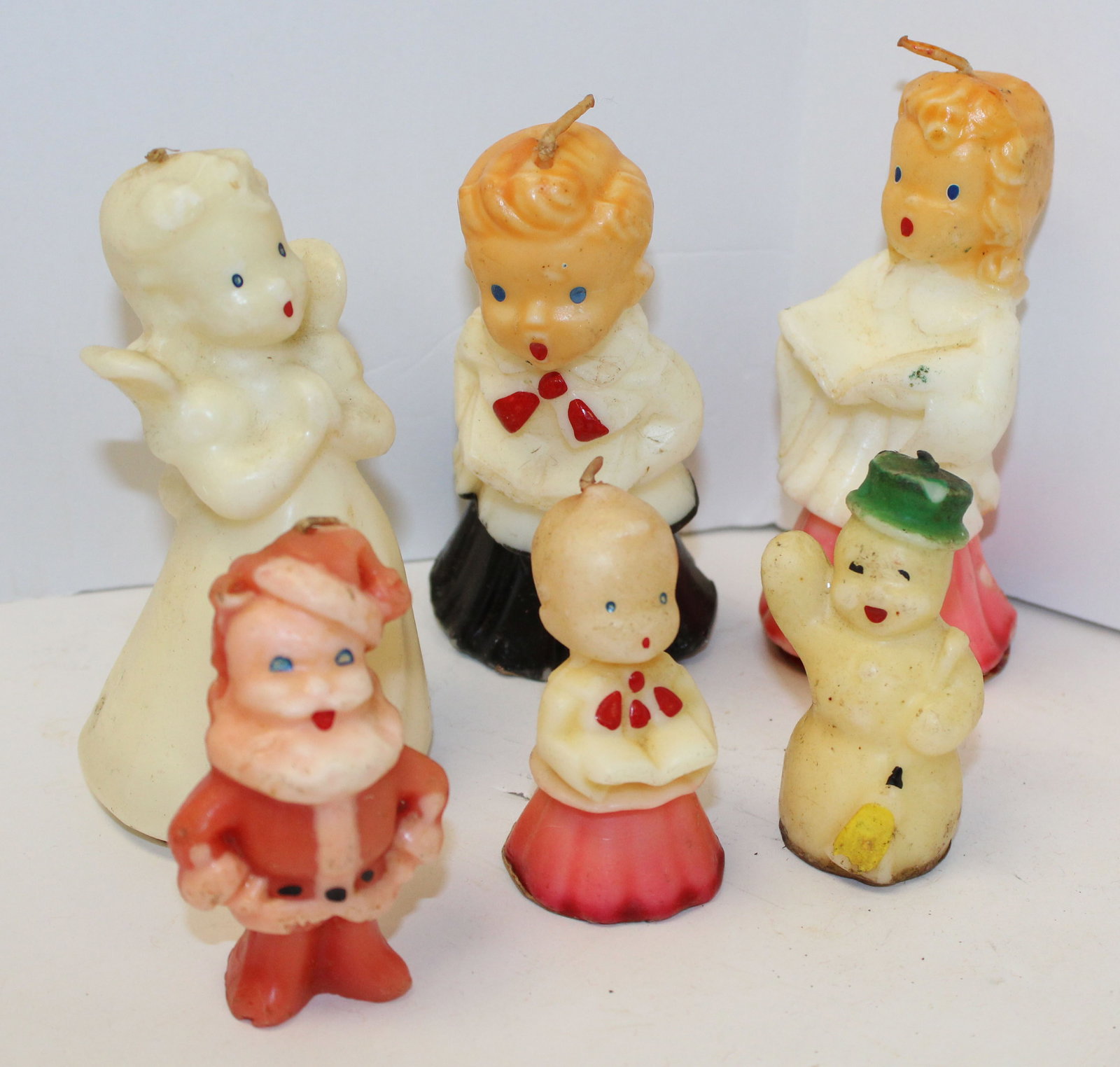 Lot of 6 figural Christmas candles incl Santa, Snowman, Angel & Choir members - 3"-5" tall: Lot of 6 figural Christmas candles incl Santa, Snowman, Angel & Choir members - 3"-5" tall