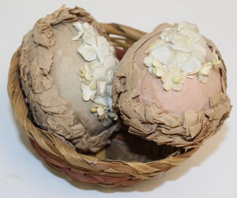 Lot of 2 crepe paper eggs w millinery trim in small basket - 4" eggs
