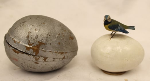 Lot of 2 antique egg candy containers - 1 silver painted & the other white w bird on top - 2" & 3"