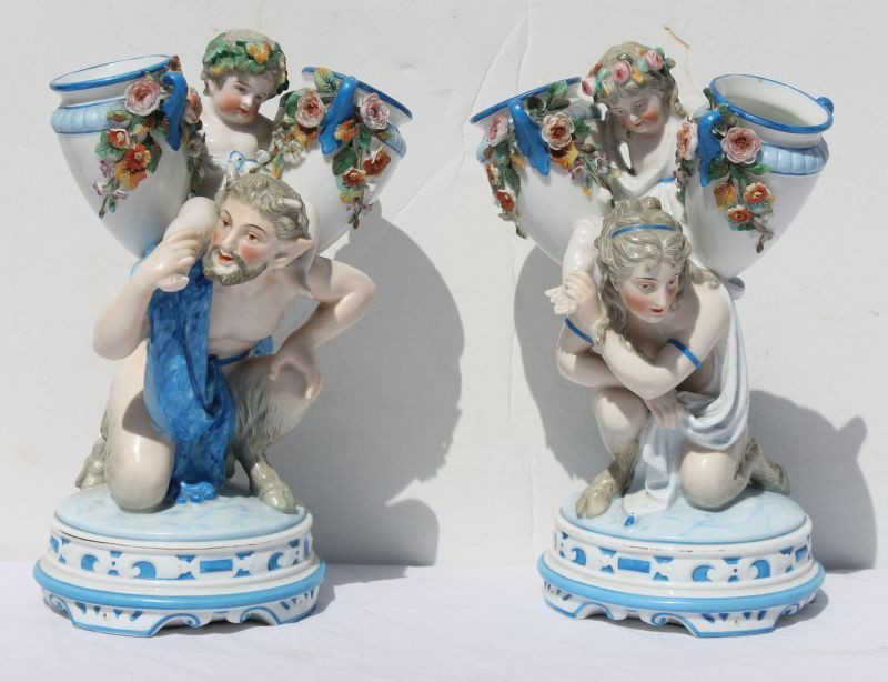pr of 10 1/4" tall KPM porcelain male & female satyrs w: pr of 10 1/4" tall KPM porcelain male & female satyrs w children on their backs spill vases - (imperfections)