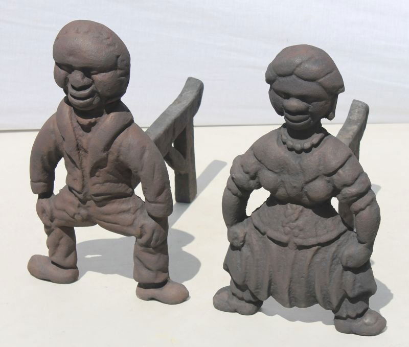 Mid 19thC pr of black figural man & woman cast iron and: Mid 19thC pr of black figural man & woman cast iron andirons attrib to an Atlanta, GA Foundry featuring puddle cast fire dogs - These pre Civil War figural andirons are believed to have been inspired