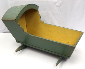 Antique hooded cradle in teal & yellow paint w floral paint dec on hood - 27" tall x 40" long x 24"