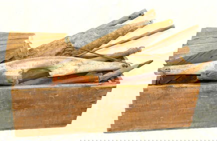 Antique treen lot in small blanket box (no lid) incl yokes, stands, etc - box is 11" tall x 36"x13"