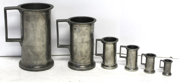 Set of 6 graduated antique pewter measures - 1 3/4" - 7 1/4" tall