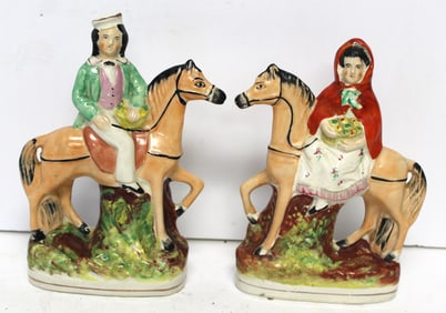 Pair of Staffordshire figurines of "Red Riding Hood and Boy" - 9 1/4" & 8 3/4" tall