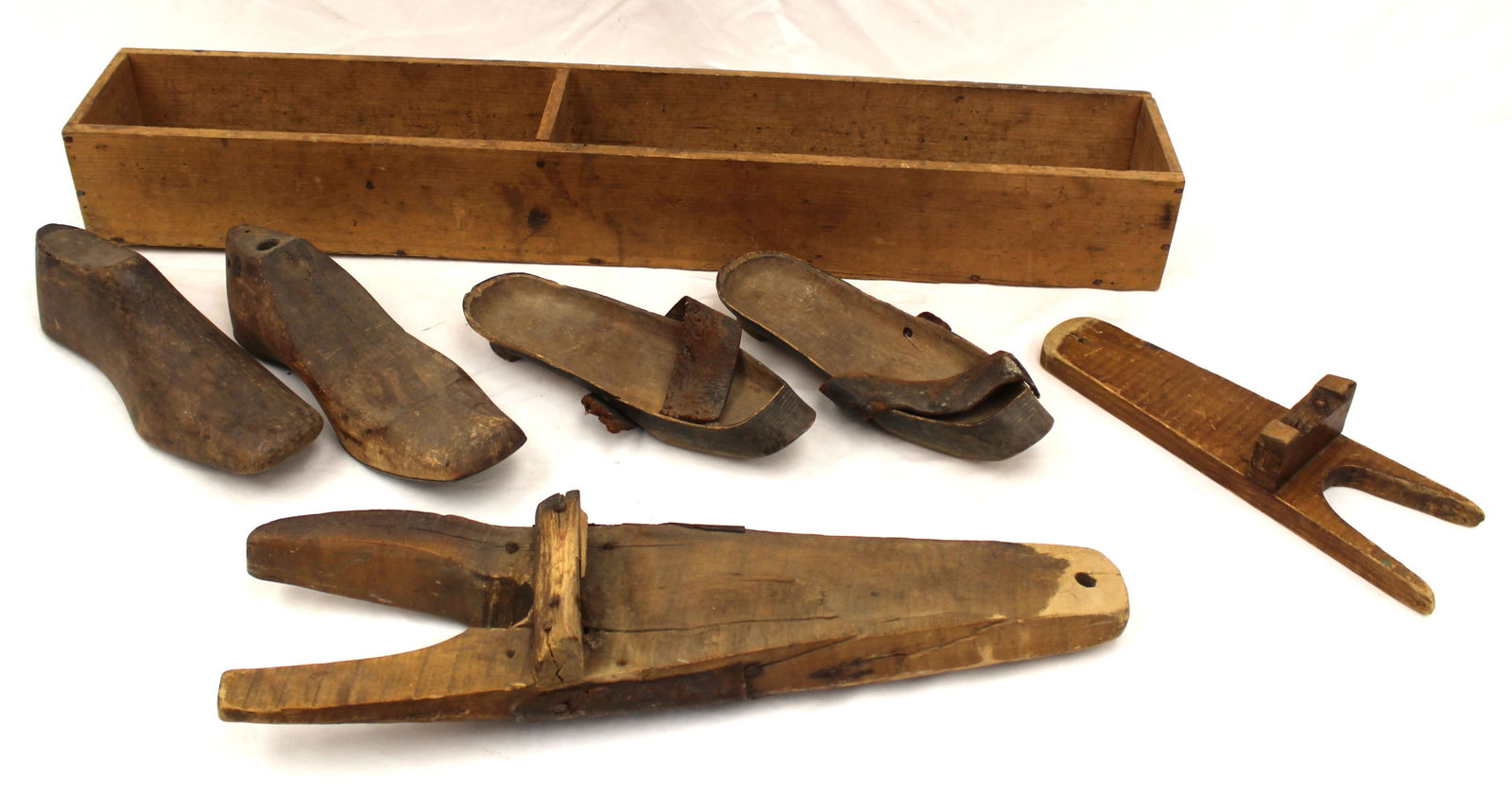 Shoe related lot incl wooden shoe form & boot jacks in a divided antique box - box is 4" tall x (1 of 7)