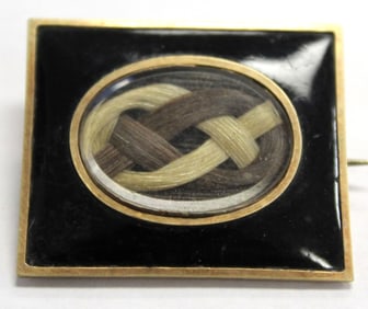 Victorian mourning brooch w braided locks of hair in rectangular gold & black enamel border