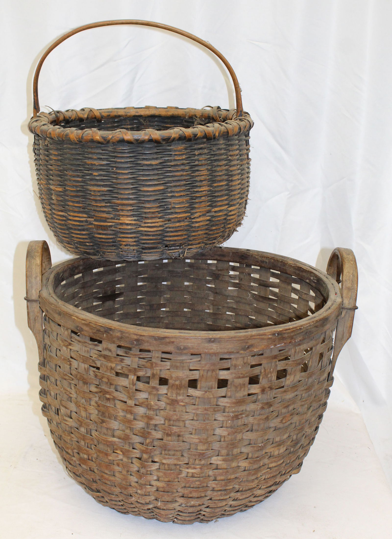 Lot of 2 antique baskets incl large 2 handled gathering & a fixed handled w traces of blue paint - (1 of 8)