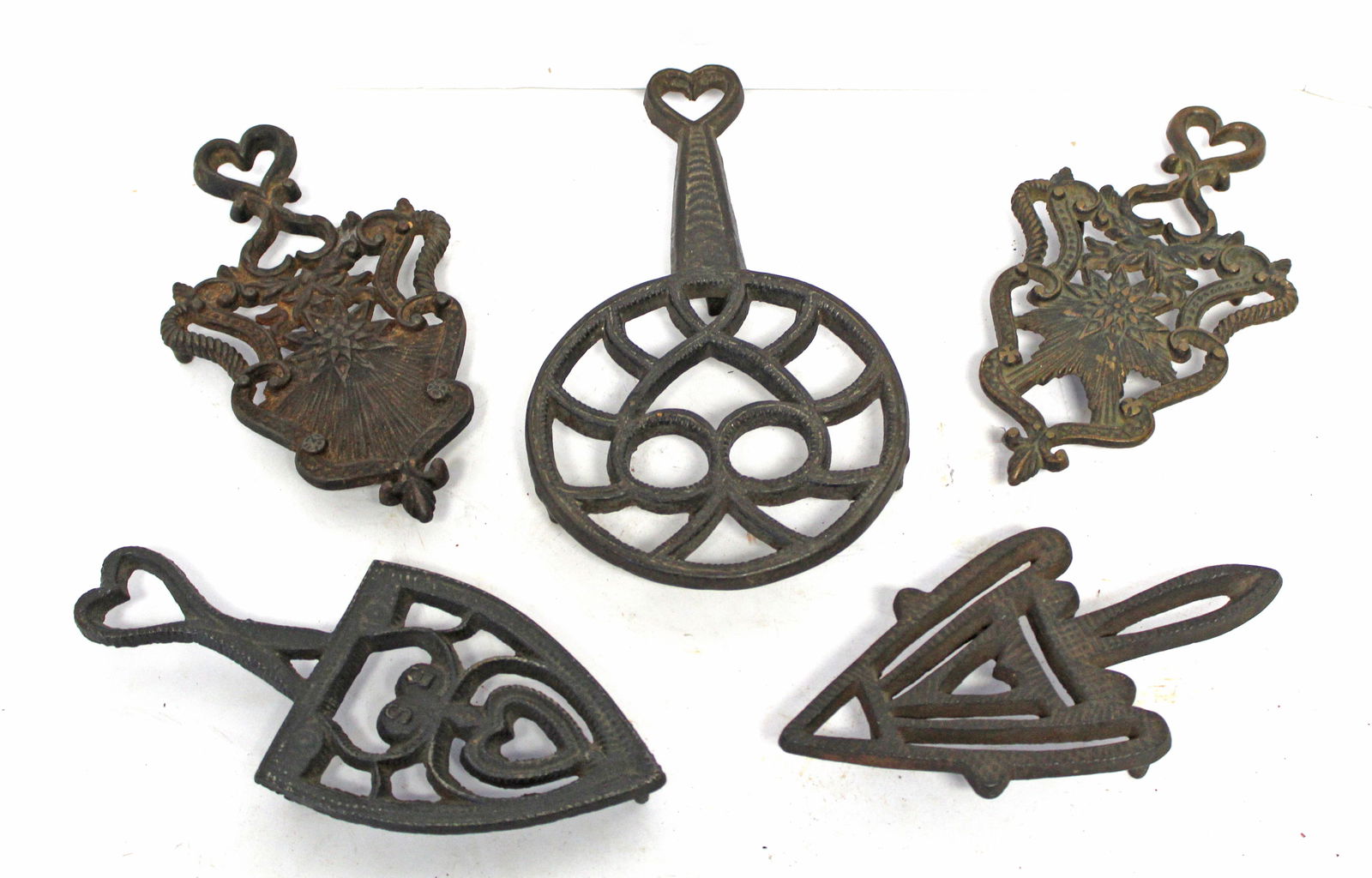 Lot of 5 antique cast iron heart motif trivets - 8" - 11" (1 of 6)