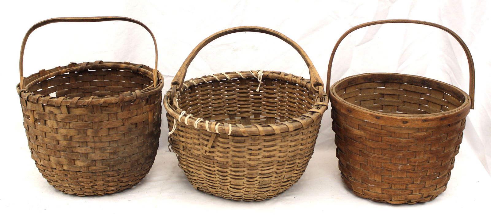 Lot of 3 fixed handled round baskets - as found - one handle detached: Lot of 3 fixed handled round baskets - as found - one handle detached