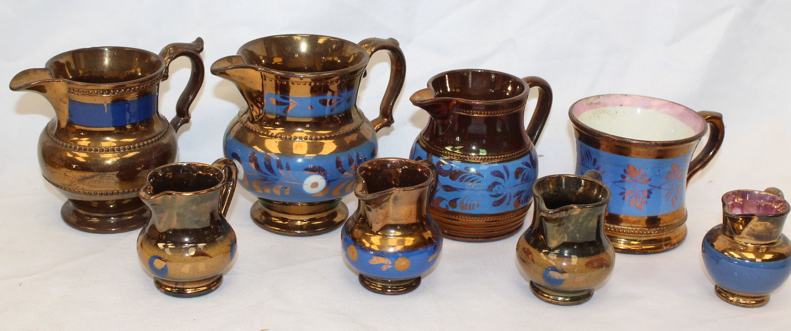 Lot of 8 pieces of Copper Luster incl pitchers/creamers & a cup (1 of 5)