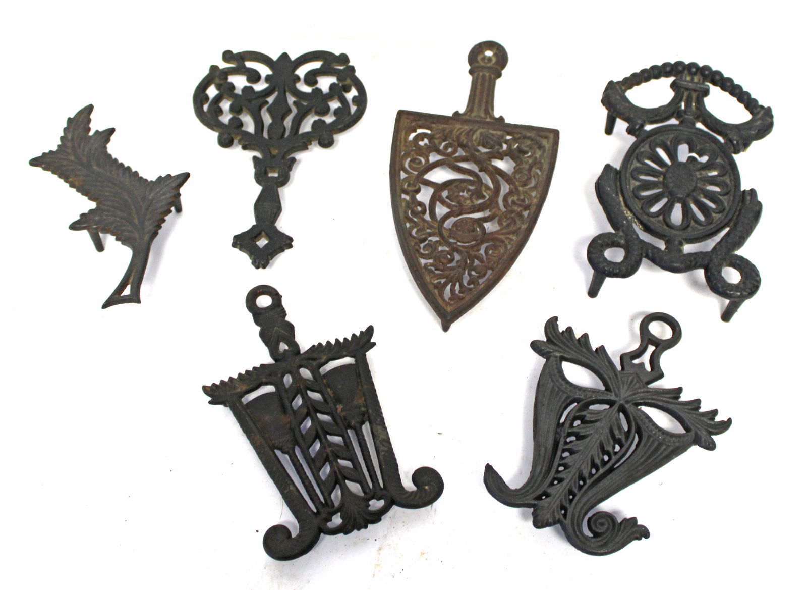 Lot of 6 antique cast iron trivets - 9"- 12" (1 of 7)