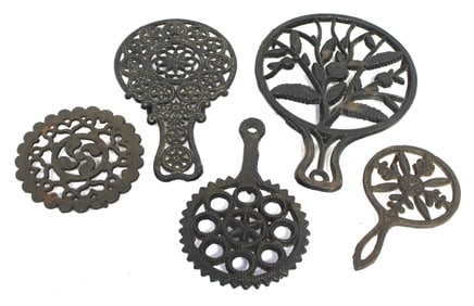 Lot of 5 antique cast iron trivets - 8"-13"