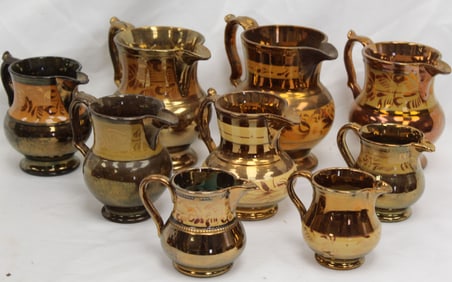 Lot of 9 Copper Luster pitchers/creamers - 3" - 5 1/2"