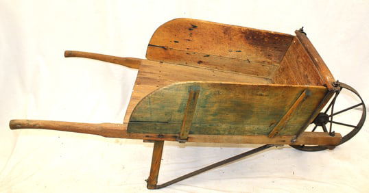 Antique wooden wheelbarrow w iron wheel & traces of green paint