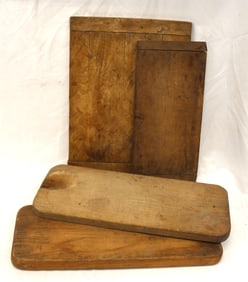 Lot of 4 antique wooden cutting/dough boards - smallest is 8"x13" & largest 18"x16"