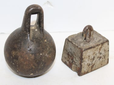 Lot of 2 antique iron weights - 4 1/2" & 2"